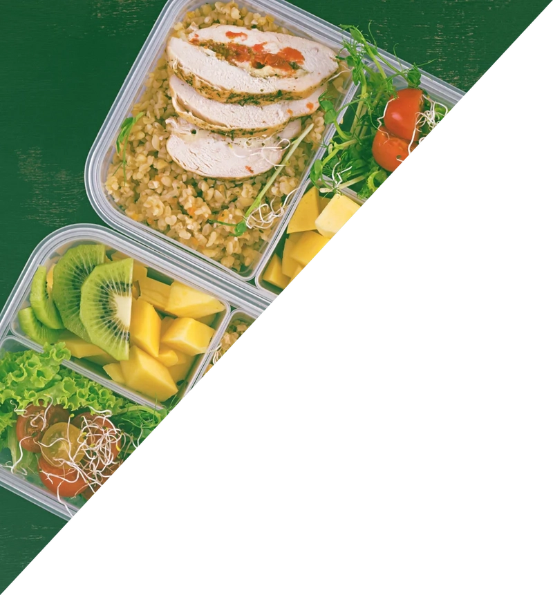 Fitfarm female member standing tall after performin a power clean.